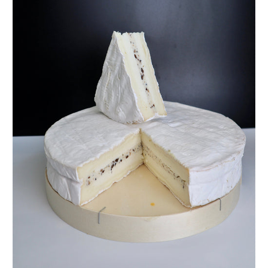 Brie with truffle wheel