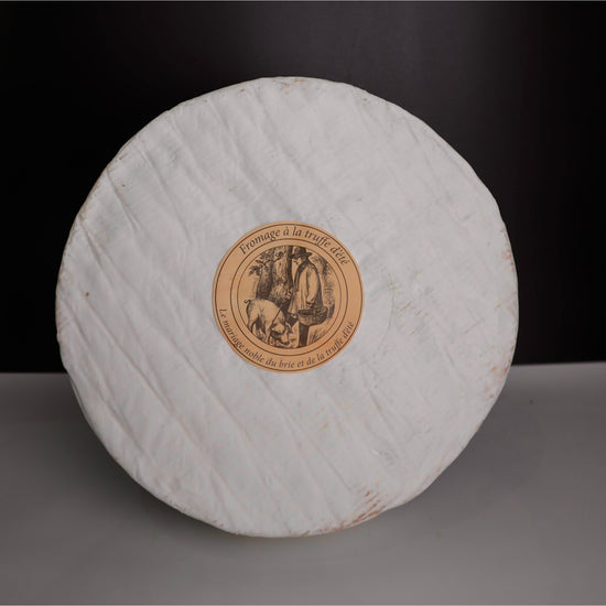 Brie with truffle wheel